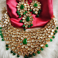 N0594_Royal designer choker necklace set studded with Kundan stones with a touch of glossy green beads.