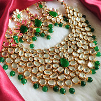 N0594_Royal designer choker necklace set studded with Kundan stones with a touch of glossy green beads.