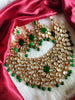 N0594_Royal designer choker necklace set studded with Kundan stones with a touch of glossy green beads.