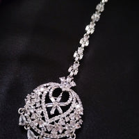 M034_Classy design American diamond studded Maang tika with delicate stone work.