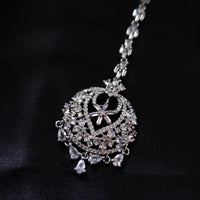 M034_Classy design American diamond studded Maang tika with delicate stone work.