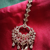 M035_Designer American diamond studded Maang tika with delicate stone work.