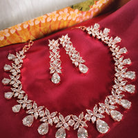 N0598_Elegant rose gold designer choker necklace embellished with american diamond stones  studded with a touch of pink stones.