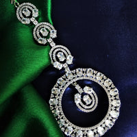 M036_Classy ciccular design American diamond studded Maang tika with delicate stone work.
