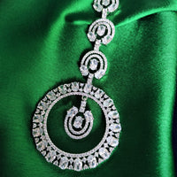 M036_Classy ciccular design American diamond studded Maang tika with delicate stone work.