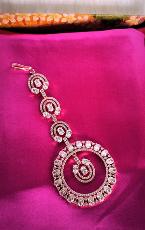 M041_Classy circular design  American diamond studded Maang tika with delicate stone work.