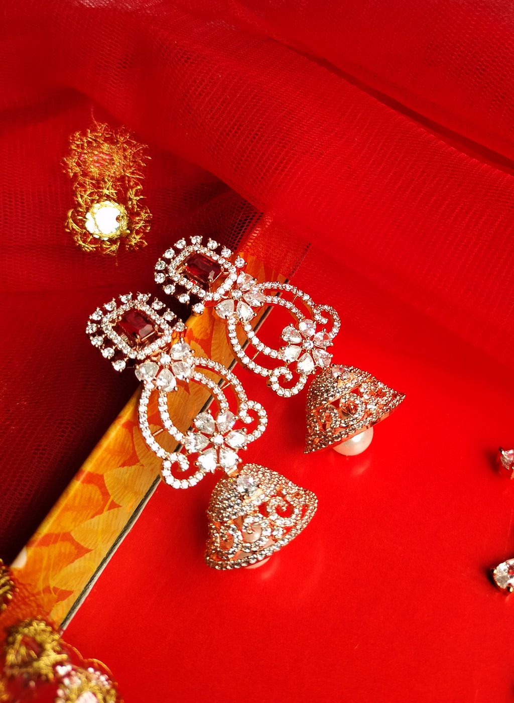 E0873_Classic designer rose gold jumkas with delicate stone work with a touch of pearl.
