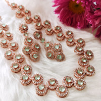 N01101_Lovely designer rose gold choker necklace embellished with American diamond stones with delicate Mint green stone work.