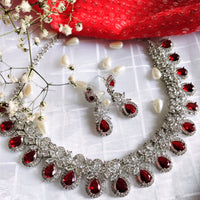 N01114_Lovely designer rodium polished choker necklace embellished with American diamond stones with delicate red stone work.