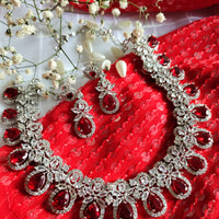 N01114_Lovely designer rodium polished choker necklace embellished with American diamond stones with delicate red stone work.