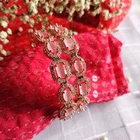 B0178_S_Elegant Rose Gold bangles embellished with American Diamond stones with a touch of dazzling pink stones.