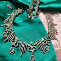 N01131_Lovely designer Rodium polished choker necklace embellished with American diamond stones with delicate white & mint green stone work.