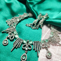 N01131_Lovely designer Rodium polished choker necklace embellished with American diamond stones with delicate white & mint green stone work.