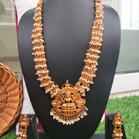 N0558_Classic temple jewelry style Lakshmi design gold plated necklace set embellished with ruby stones with a touch of pearls.