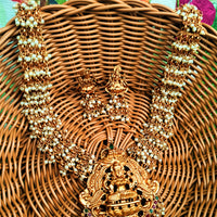 N0558_Classic temple jewelry style Lakshmi design gold plated necklace set embellished with ruby stones with a touch of pearls.