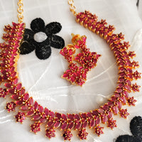 N01172_Grand Lovely designer Gold polished choker Necklace Set  embellished with American diamond stones with delicate Ruby Stones and flower work.