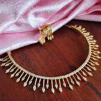 N01166_Grand Lovely designer Gold polished choker Necklace Set  embellished with American diamond stones with delicate white Stones work.