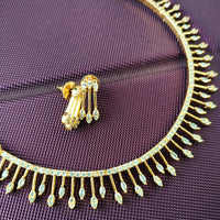 N01166_Grand Lovely designer Gold polished choker Necklace Set  embellished with American diamond stones with delicate white Stones work.