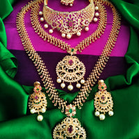 N01176_Grand Lovely designer Gold polished 3 set of Necklaces  embellished with American diamond stones with delicate White & ruby Stones .