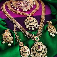 N01176_Grand Lovely designer Gold polished 3 set of Necklaces  embellished with American diamond stones with delicate White & ruby Stones .