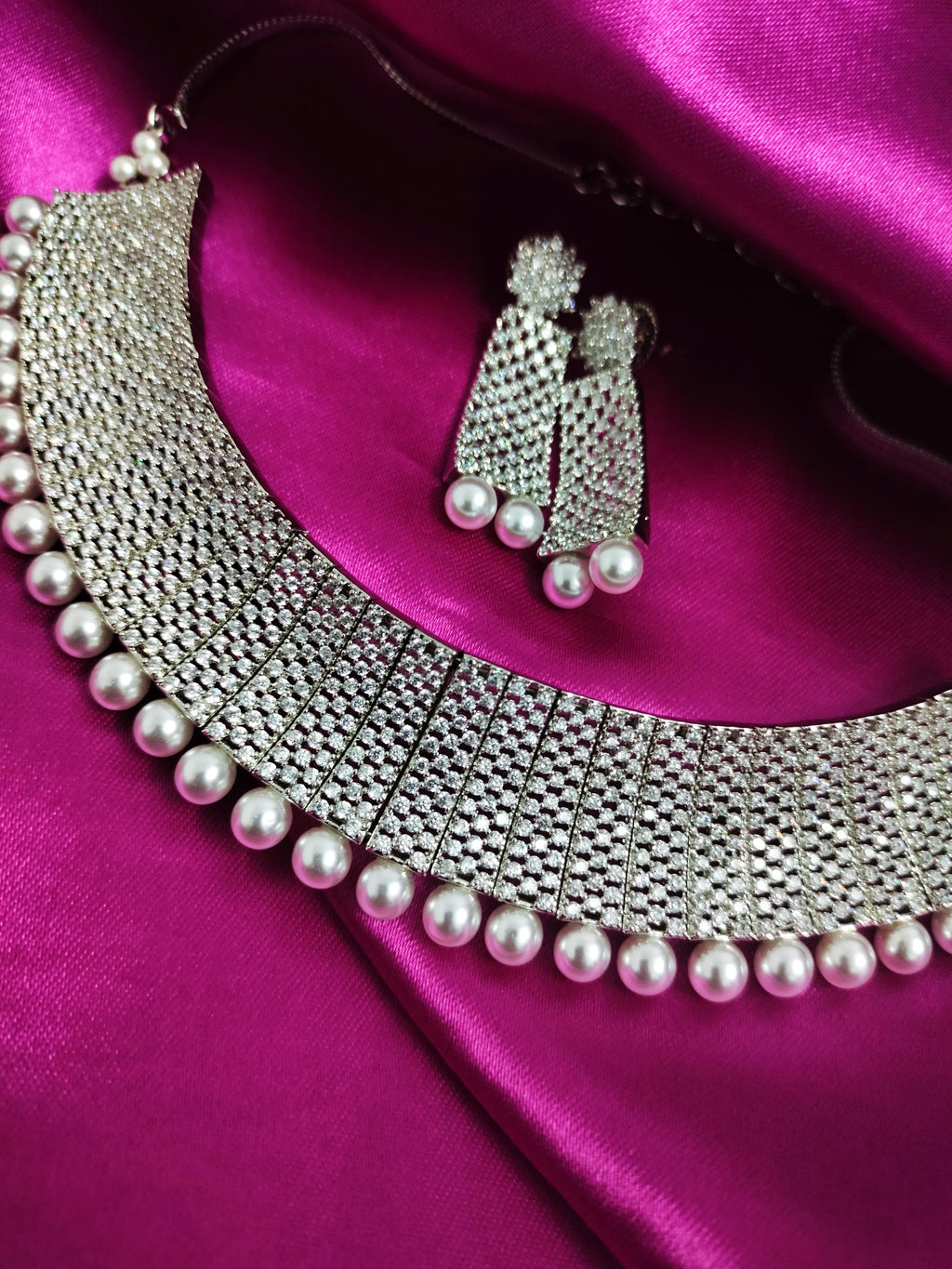 N01179_Grand Lovely designer Silver polished Necklace Set  embellished with American diamond stones with delicate white Stones .