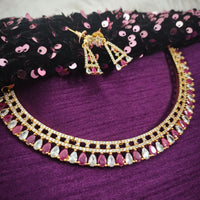 N01188_Grand Lovely designer Gold polished Necklace Set  embellished with American diamond stones with delicate Dark Pink Stones .