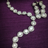 N01177_Grand Lovely designer Silver polished Necklace Set  embellished with American diamond stones with delicate white Stones .