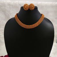 N0561_Classic temple jewelry style crafted design gold plated necklace set embellished with ruby stones .