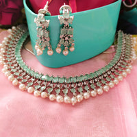 N01148_Grand Lovely designer Silver polished choker necklace embellished with American diamond stones with delicate mint green and pearl work.