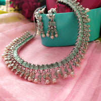 N01148_Grand Lovely designer Silver polished choker necklace embellished with American diamond stones with delicate mint green and pearl work.