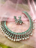 N01148_Grand Lovely designer Silver polished choker necklace embellished with American diamond stones with delicate mint green and pearl work.