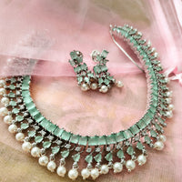 N01148_Grand Lovely designer Silver polished choker necklace embellished with American diamond stones with delicate mint green and pearl work.