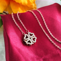 N01205_ Magnetic elegant design Rose gold Polished American Diamond pendant necklace studded with beautiful dazzling stones .
