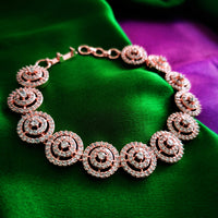 B0313_Classy circular design rose gold polished bracelets studded with  a touch of American diamond stones with delicate patterns.