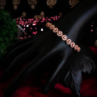 B0312_Classy circular design rose gold polished bracelets studded with  a touch of American diamond stones with delicate patterns.