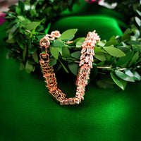B0311_Classy circular design rose gold polished bracelets studded with  a touch of American diamond stones with delicate patterns.