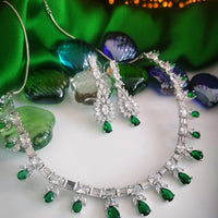 N02002_Classic silver polished choker style crafted design necklace set embellished with  green stones .