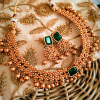 N03019_Classic matte gold polished temple jewelry style  crafted design gold plated necklace set embellished with green stones .