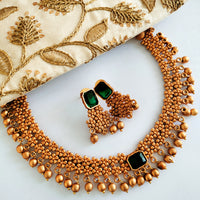 N03019_Classic matte gold polished temple jewelry style  crafted design gold plated necklace set embellished with green stones .