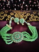 N02020_Classic designer Grape Green pearl crystal Grand round shaped pendant choker necklace set studded  with  American diamond stones.