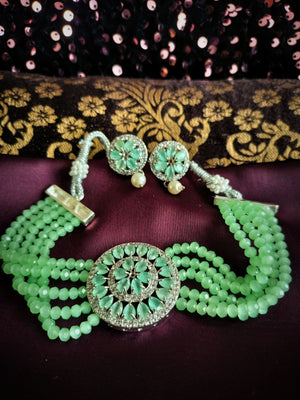 N02020_Classic designer Grape Green pearl crystal Grand round shaped pendant choker necklace set studded  with  American diamond stones.