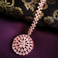M044_Lovely designer  American diamond studded rose gold polished Maang tika with a touch of pink stones.