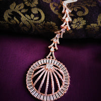 M029_Elegant circular design rose gold American diamond studded Maang tika with delicate stone work.