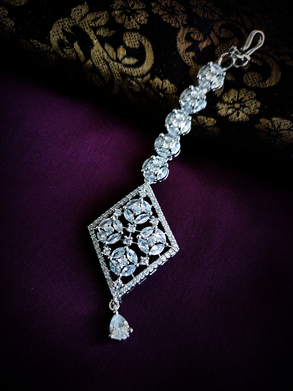 M038_Elegant diamond design American diamond studded Maang tika with delicate stone work.