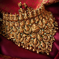 N03065_Grand Choker classic matte gold polished temple jewelry style crafted design gold plated necklace set embellished with ruby and green stones .