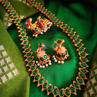 N03024_Reversible classic matte gold polished long temple jewelry style crafted design gold plated necklace set embellished with ruby and green stones .