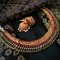 N03026_ classic matte gold polished temple jewelry choker style crafted design gold plated necklace set embellished with ruby and green stones .