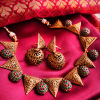 N0562_Classic Mangal sutra  jewelry style crafted design gold plated necklace set embellished with ruby and green stones .