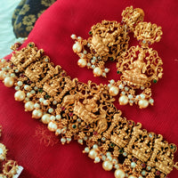 N03040_ classic matte gold polished temple jewelry choker style crafted design gold plated necklace set embellished with ruby and green stones .