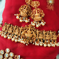 N03040_ classic matte gold polished temple jewelry choker style crafted design gold plated necklace set embellished with ruby and green stones .